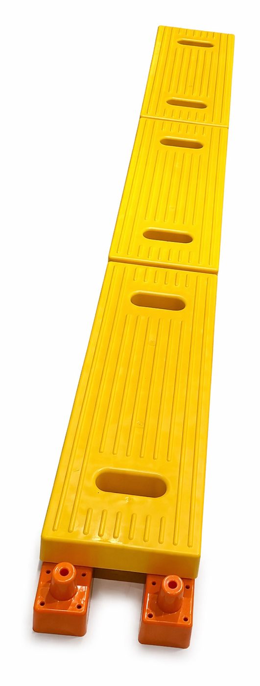 A single run of StrikeMatz boards locked end to end on orange HDPE feet