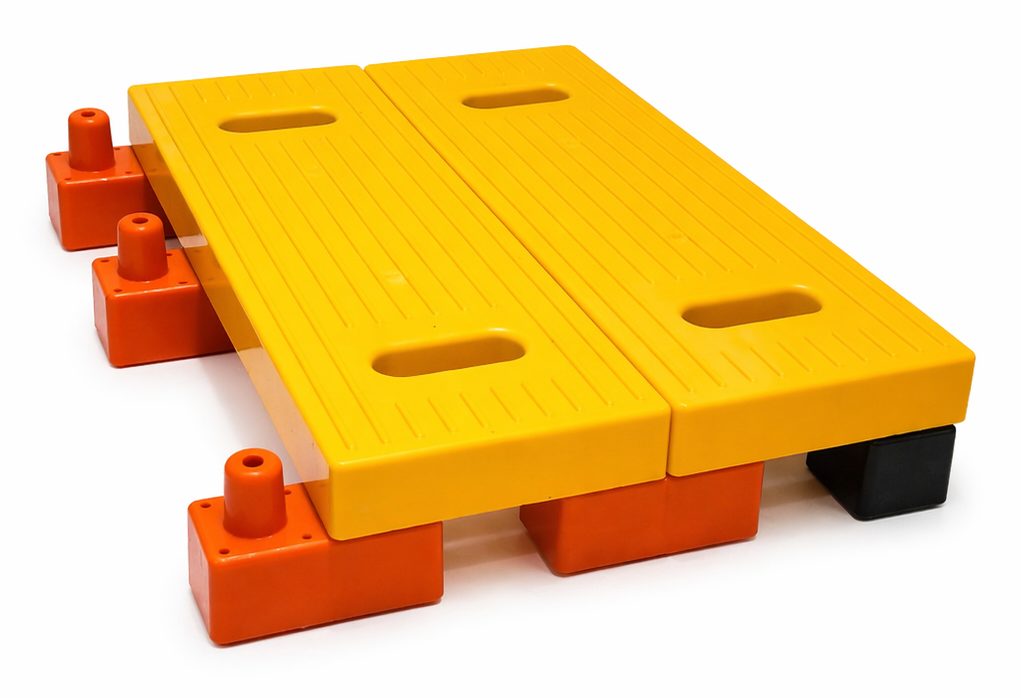 A two-board StrikeMatz deck supported on orange and black HDPE feet